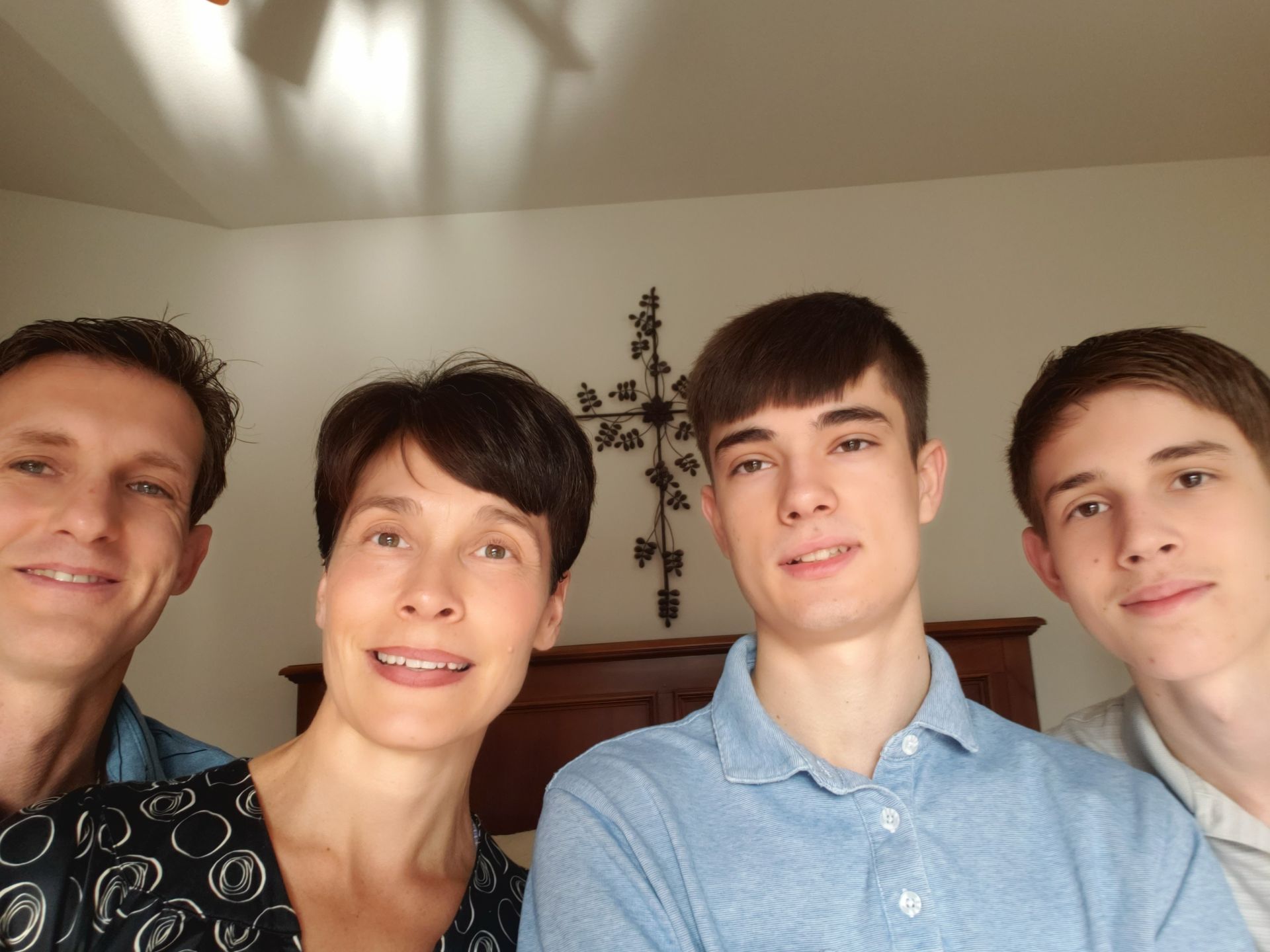 Picture of Scott Cline entire family, his wife Stephane, Son Cameron, Son Nolan with text get back on track.